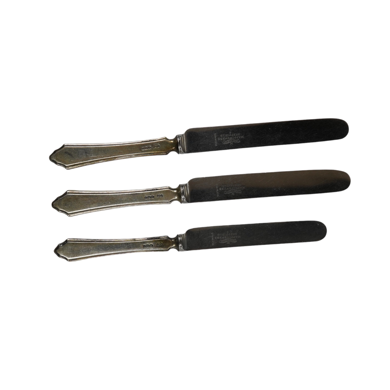 A set of twelve George V silver handled table knives and twelve matching dessert knives, Mappin & Webb, Sheffield, 1926, eight other silver handled dessert knives and a silver handled carving knife. Condition - poor to f